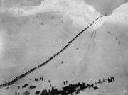 Miners and prospectors ascend the Chilkoot Pass.